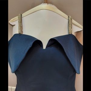 Beautiful one of a kind formal gown in a Navy crepe material, size 12.
